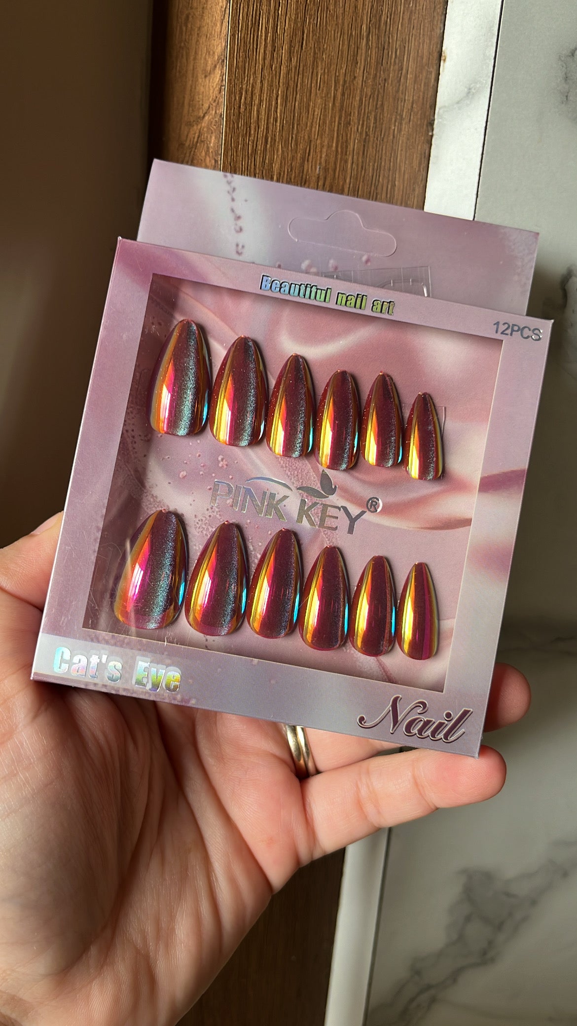 Maroon gold holographic nails