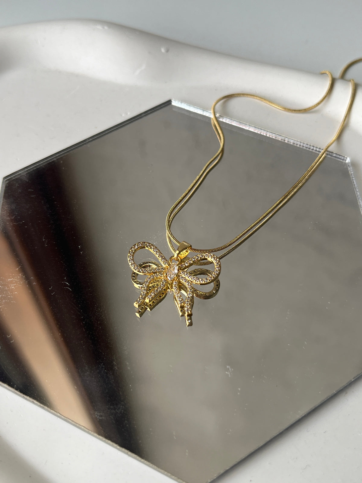 Premium bow pendant