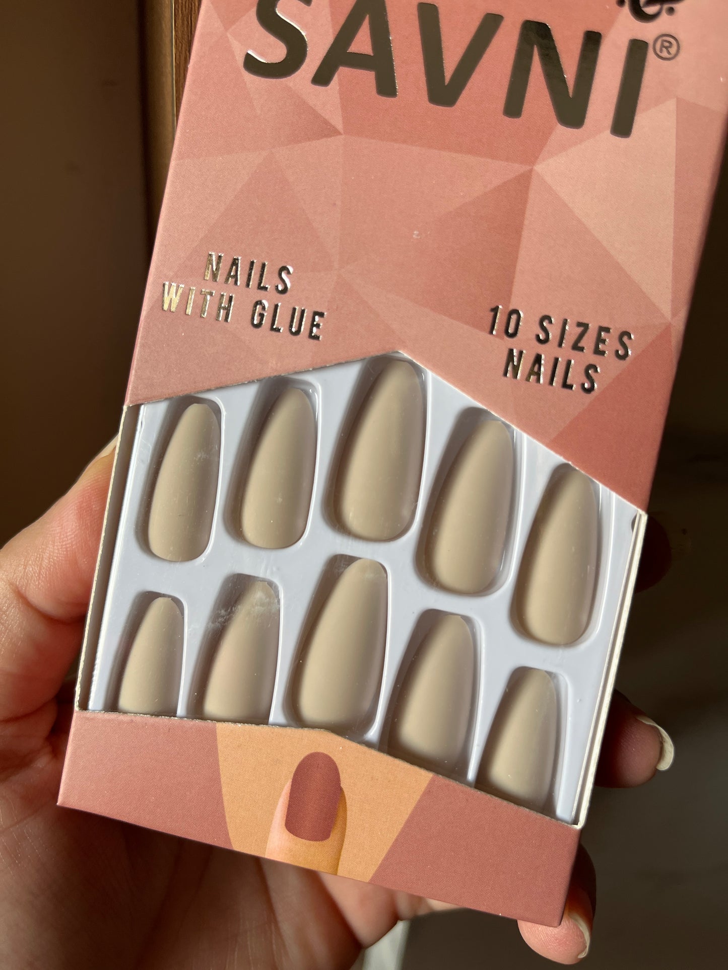 Light nude matte nails with tabs