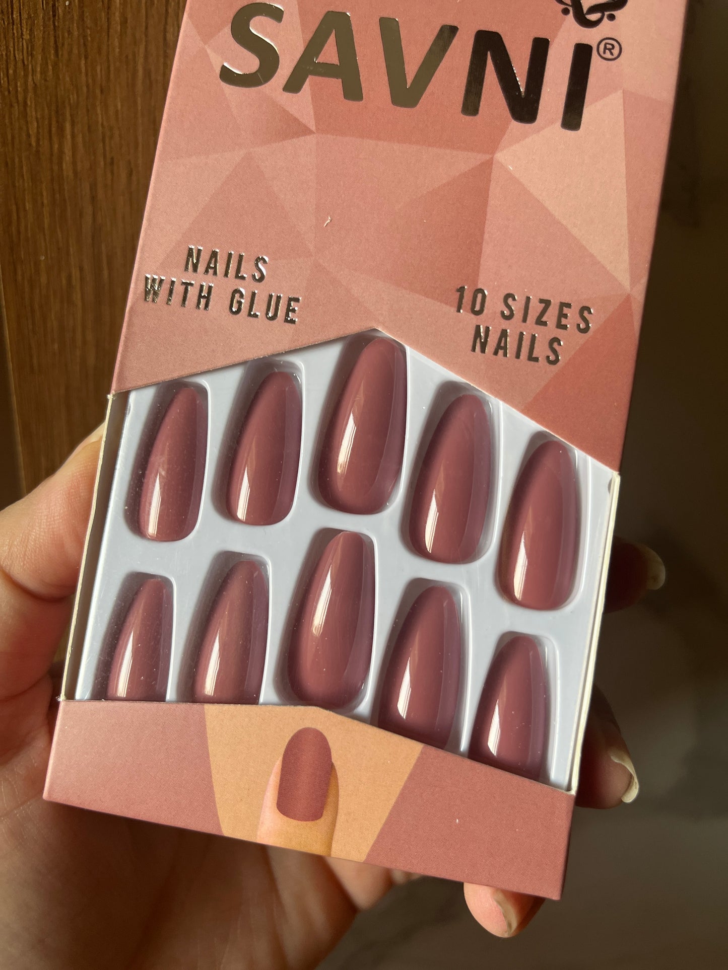 Dark nude gloss nails with tabs