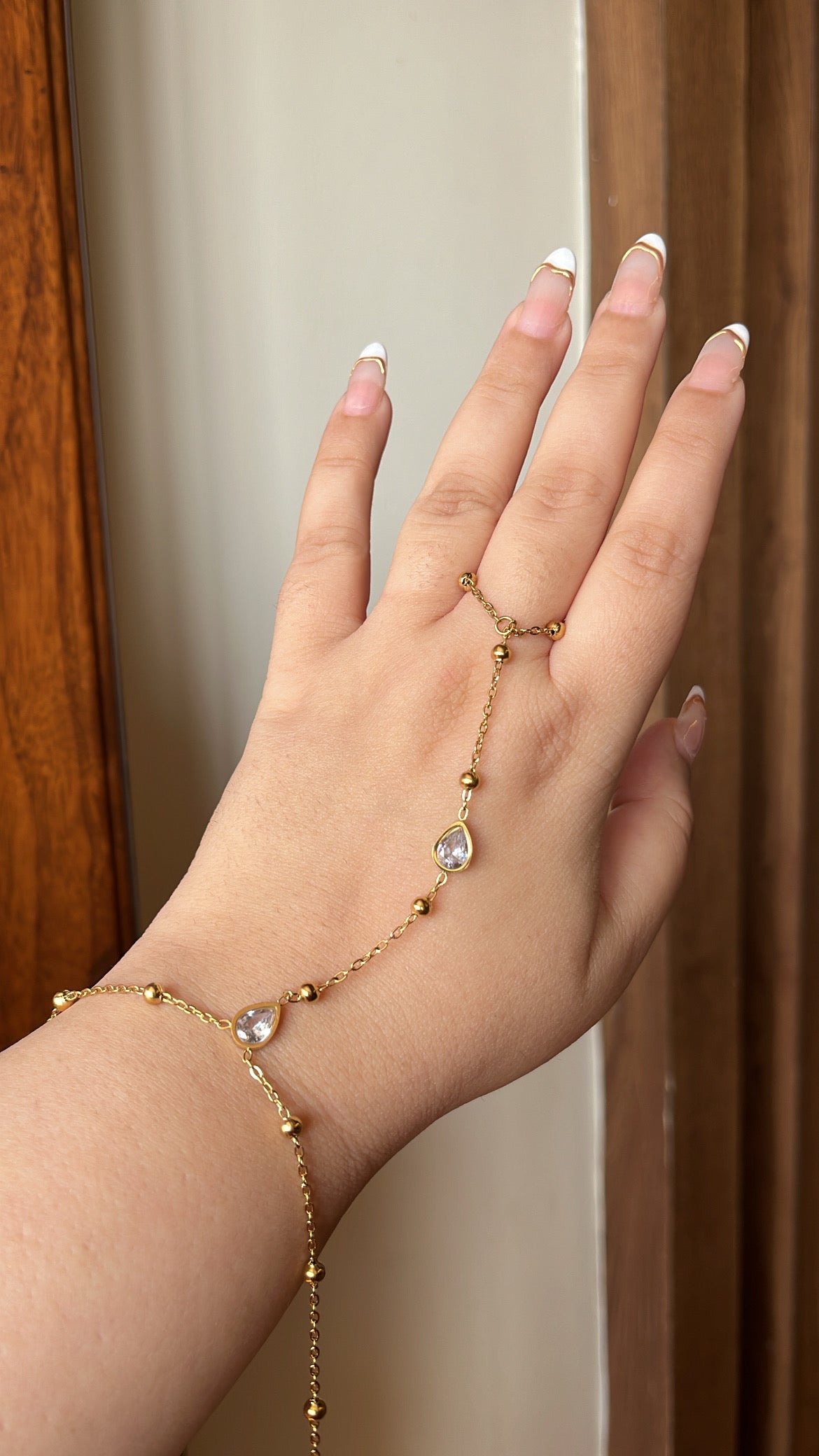 White teardrop handchain