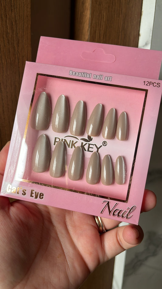 Dark nude cat eye nails