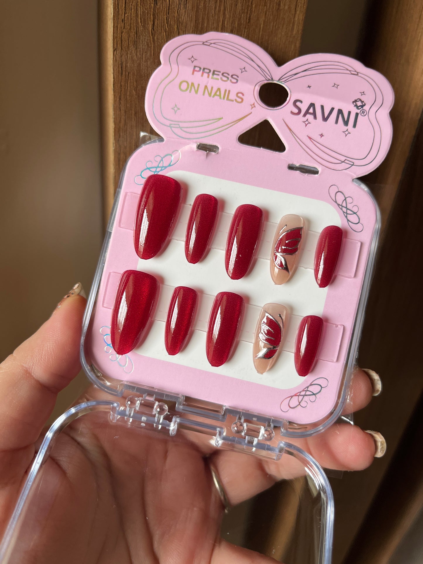 Red cat eye with butterfly nails