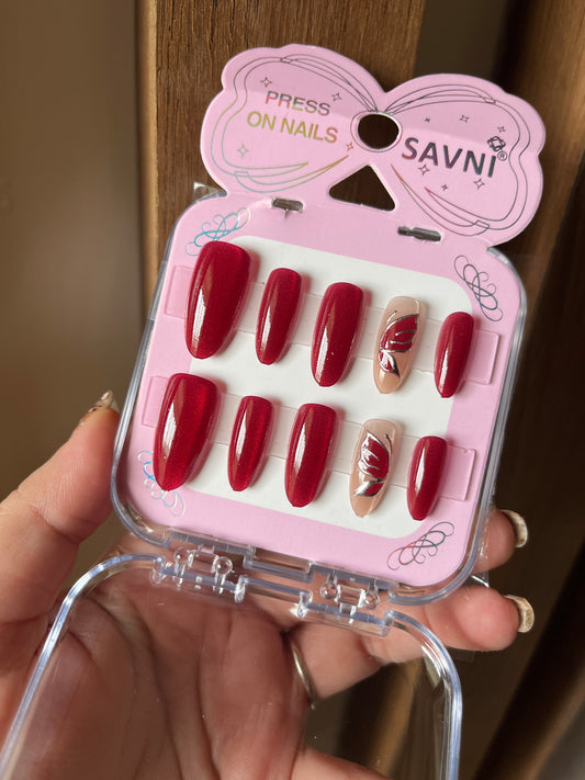 Red cat eye with butterfly nails