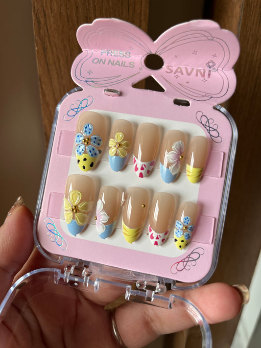 Butter yellow blue vacation nails