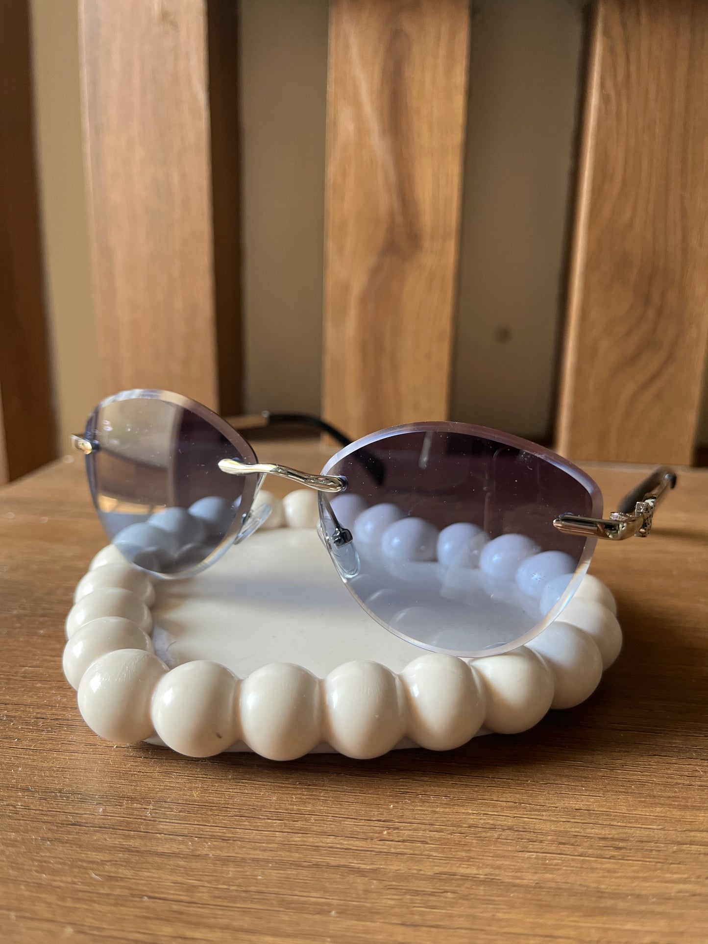 Blue rimless sunglasses