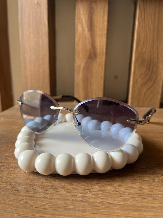 Blue rimless sunglasses