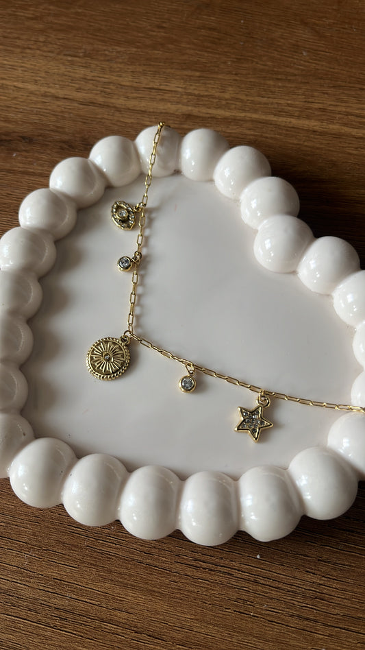 Evil eye gold charm bracelet