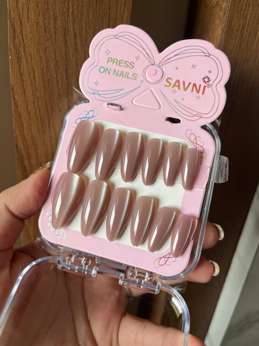 Dark nude cat eye nails