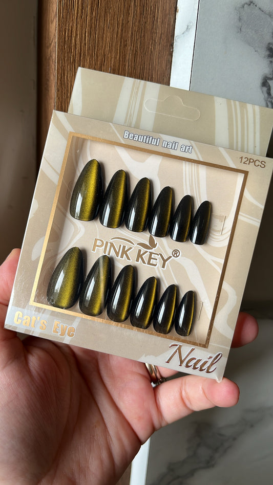 Black with green cat eye