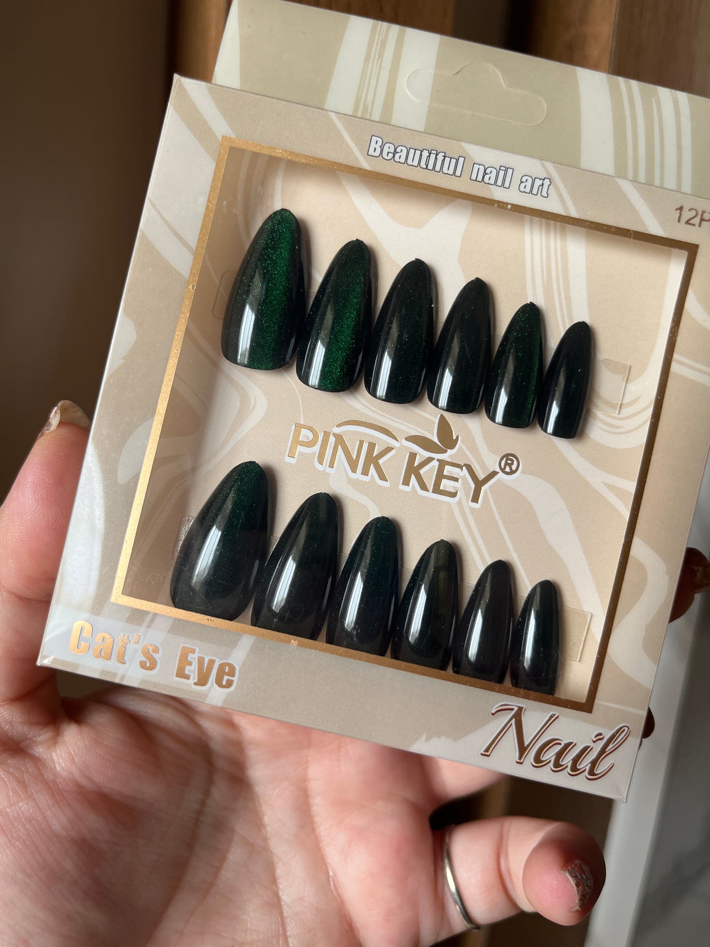 Emerald green cat eye nails