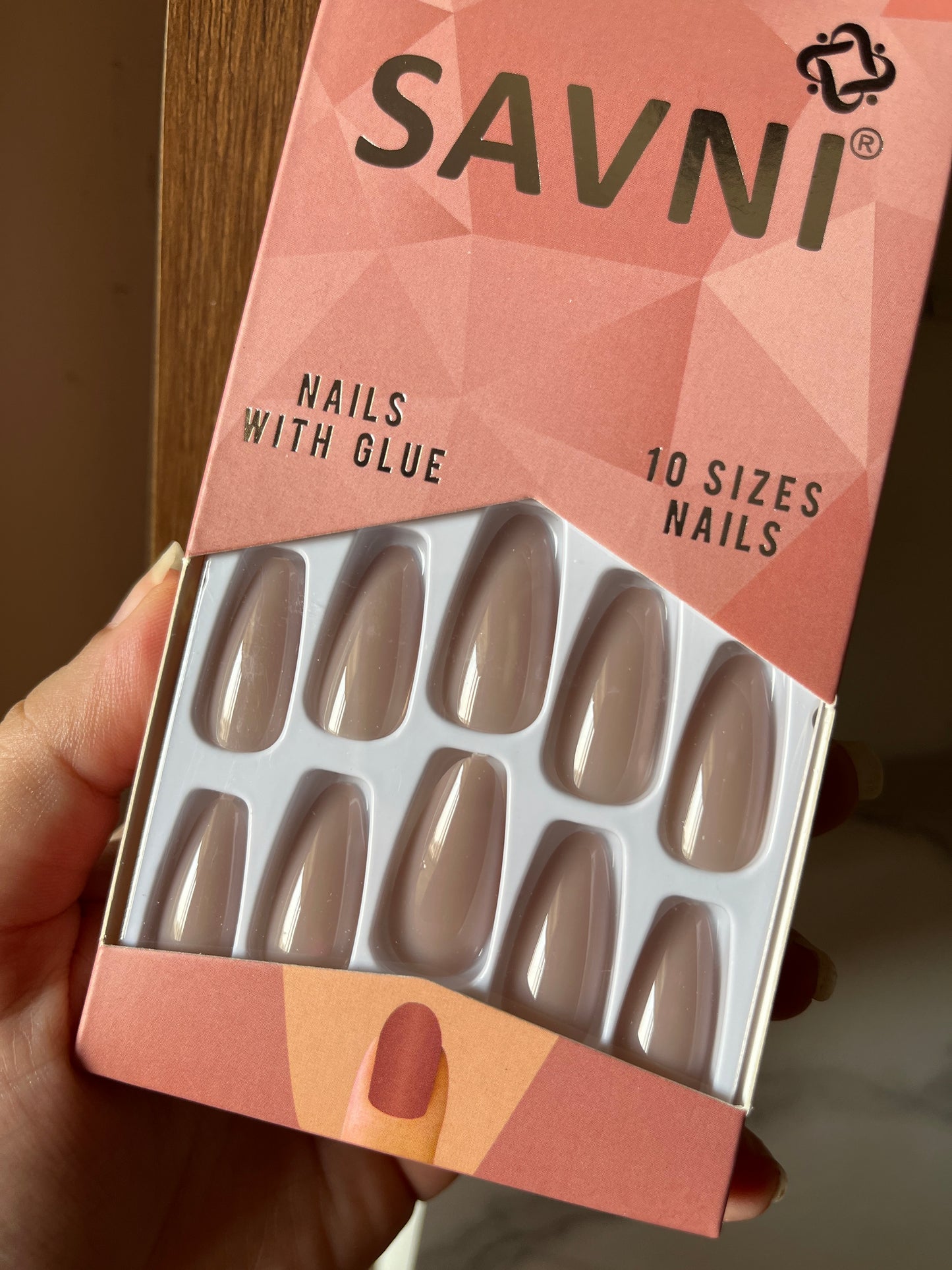 Nude gloss nails with tabs