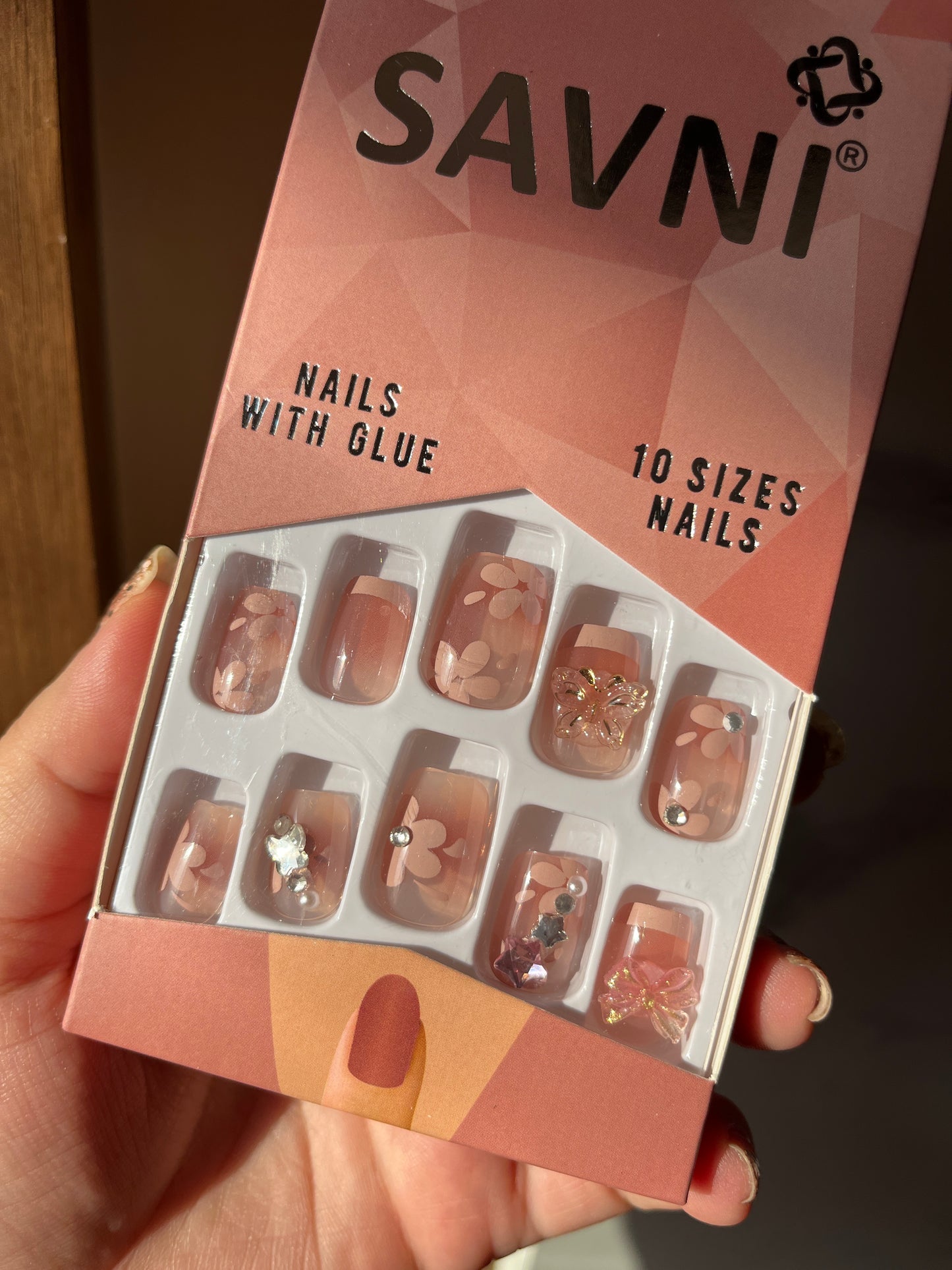 Nude floral stone nails