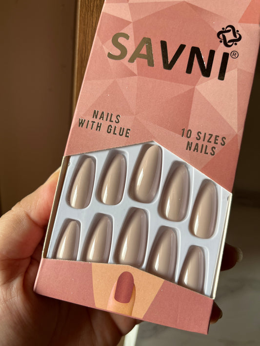 Light nude gloss nails with tabs