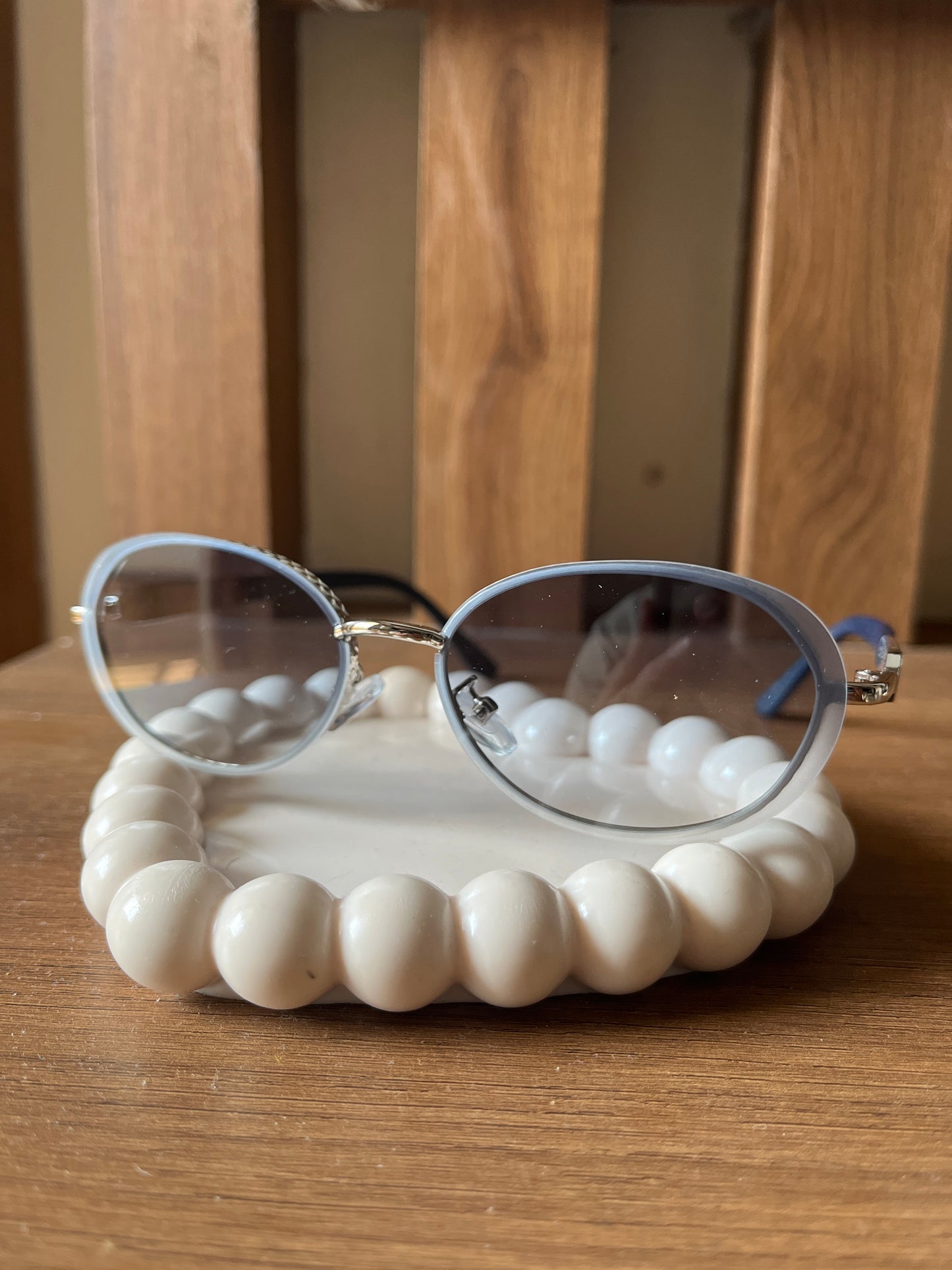 Blue oval sunglasses